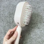 Electric Spray Air Cushion Massage Comb photo review