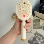Electric Spray Air Cushion Massage Comb photo review